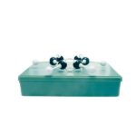 Molecular model of a chemical compound on a green storage box, science and chemistry concept.