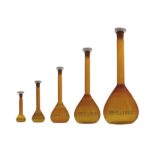 1. Lab glassware with chemical solutions for scientific experiments and chemical analysis.